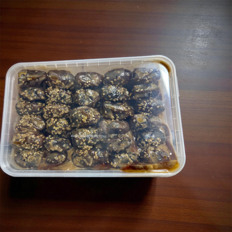 خرما کنجد و ارده درجه ١ عمو رجب